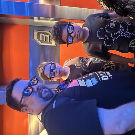 My father and 2 brothers posing all cool at Disney