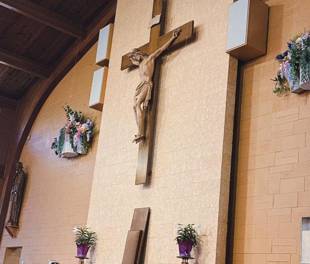inside a church with cross in middle